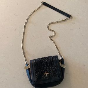 Black leather purse with gold-tone hardware